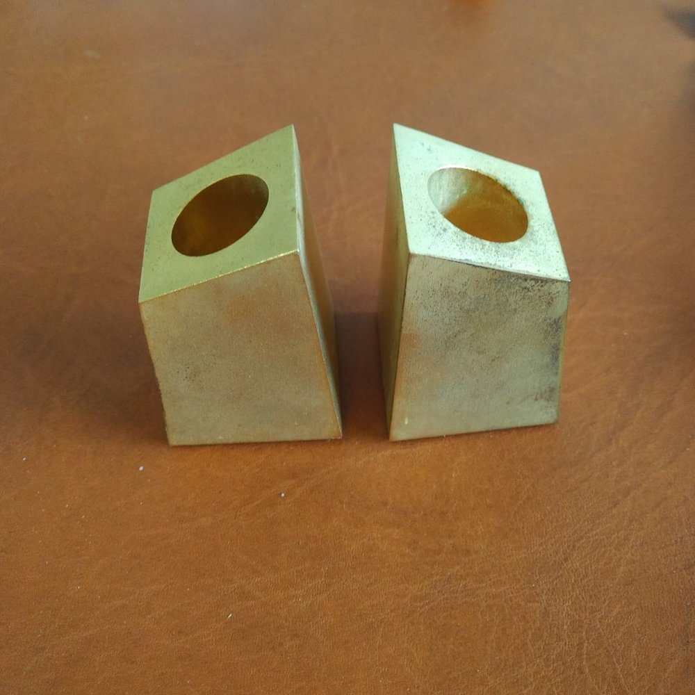 PAIR OF MATTE GOLD SHORT ANGULAR CANDLESTICKS